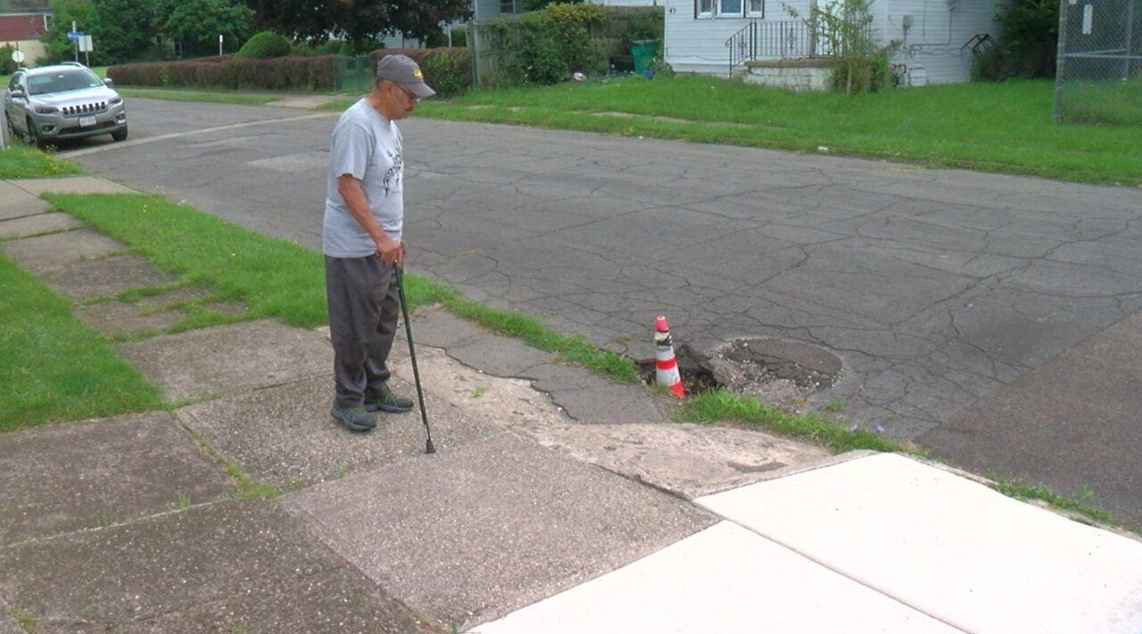 Buffalo homeowner learns he's responsible for fixing a sinkhole in the street outside his home