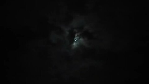 Storm Clouds passing by the Waxing Gibbous Moon