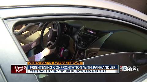 Woman says panhandler punctured her tire