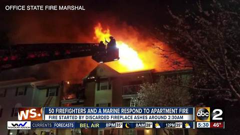 50 firefighters and a Marine helped families escape an apartment fire