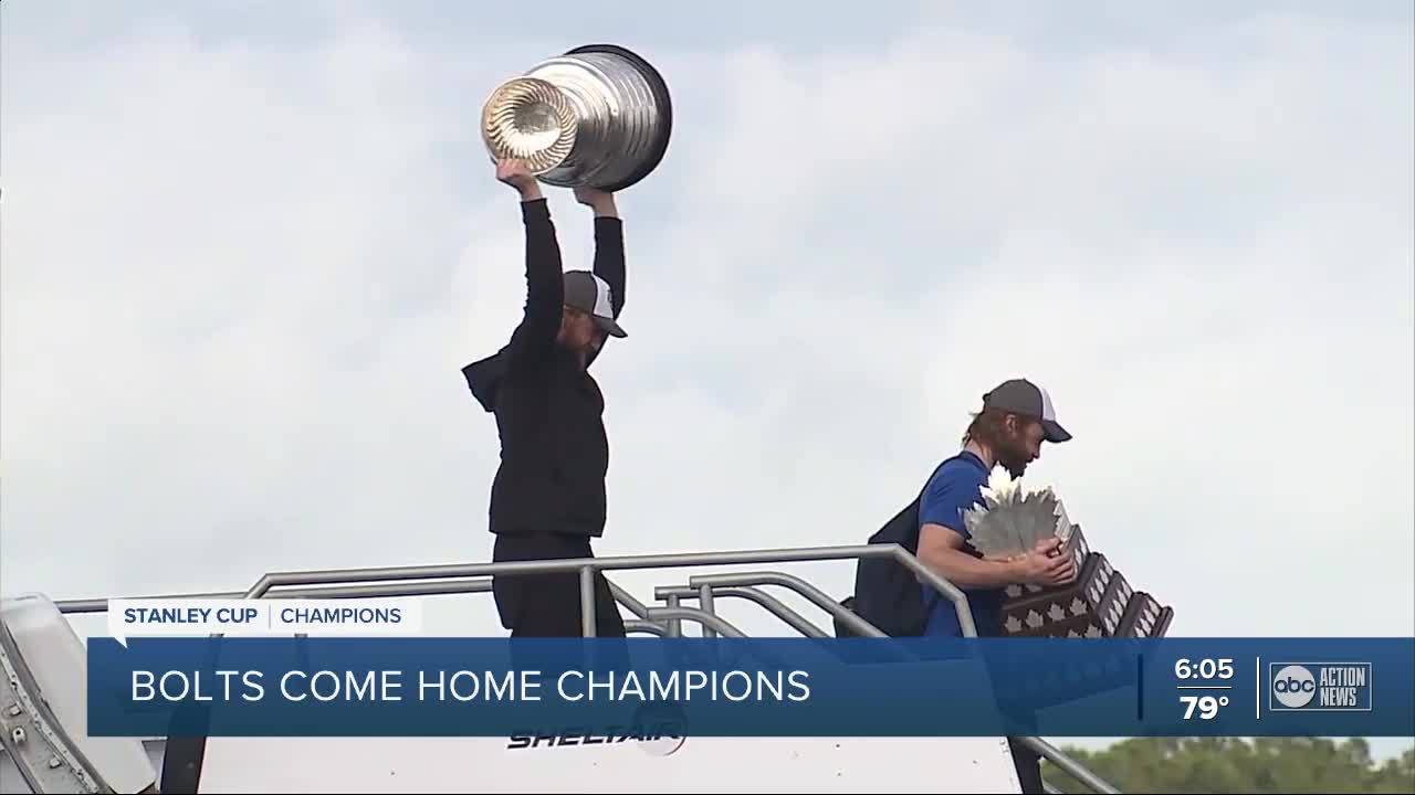 Bolts touch down Tampa Int'l Airport after winning Stanley Cup