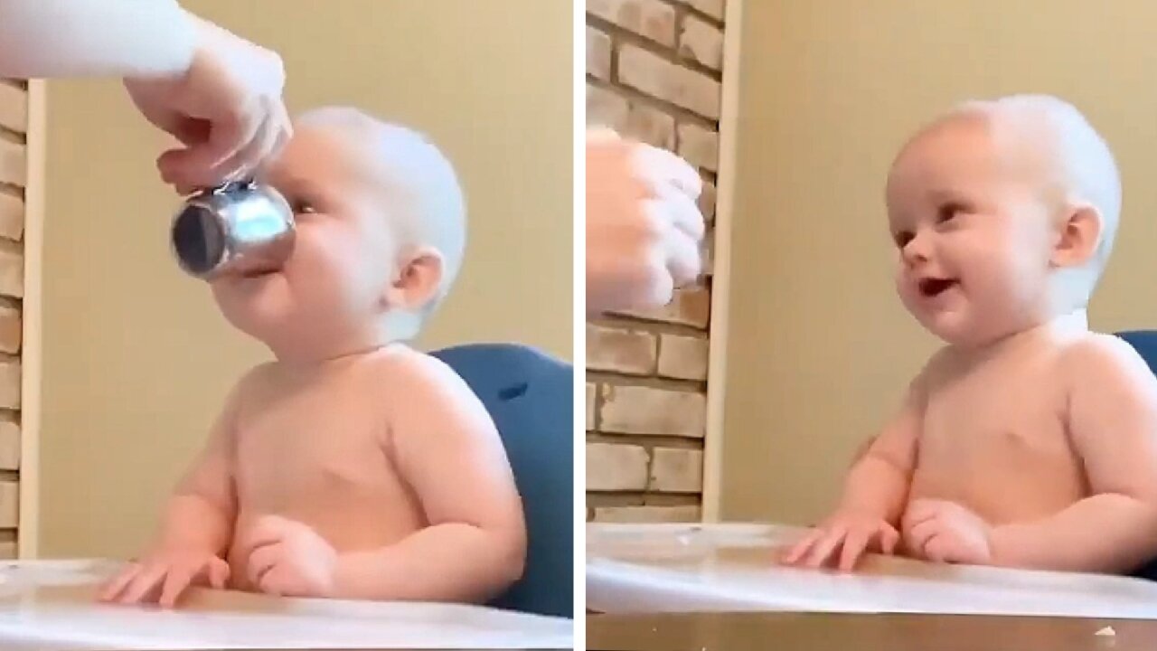 Very Funny Baby Drinking From The Same Mug As His Mom