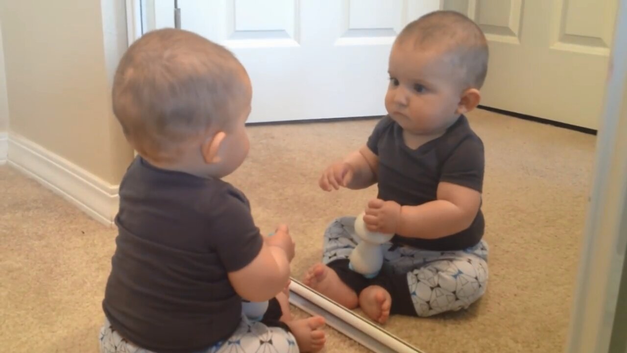 Baby Scared to see him on mirror