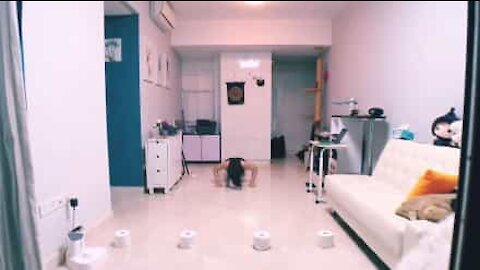 Woman's epic home workout with toilet paper
