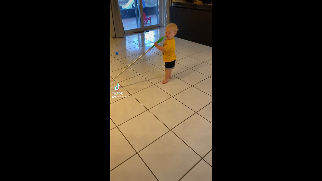 Toddler Helps Clean the Floor