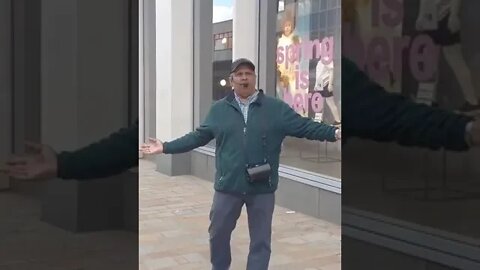 Brother Vas preaching the gospel in Sheffield.