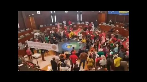 Protestors against vaxx passports and mandates burst into parliament in Guadeloupe.