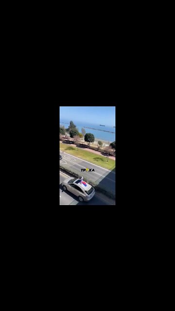 In Cyprus, children throw stones at cars with a Russian flag on them