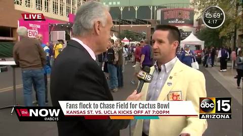 Fans flock to Chase Field for the Cactus Bowl in Phoenix