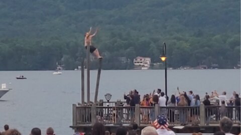 Guy caught jumping off wobbly pole into Lake George