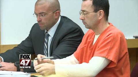 Reports: Plea in child porn case signed by gymnastics doctor
