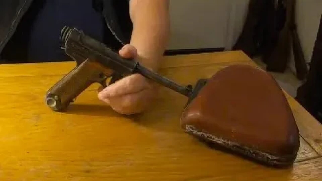 Type 14 Nambu Japanese service pistol with a Type 38 Arisaka Rifle