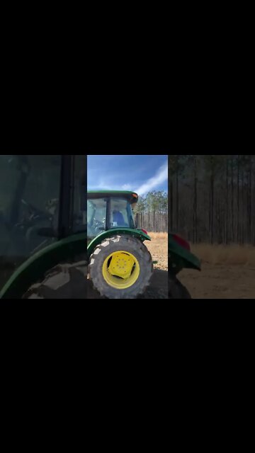 Norman gets to ride along with daddy in the tractor