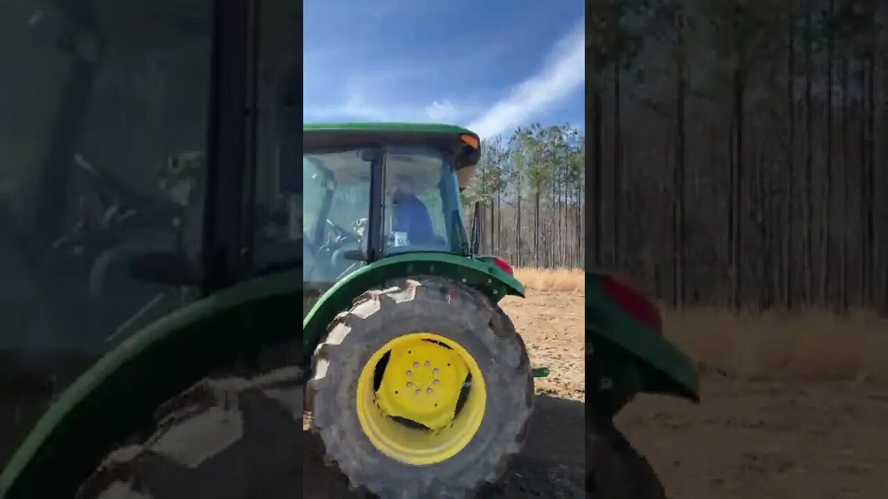 Norman gets to ride along with daddy in the tractor