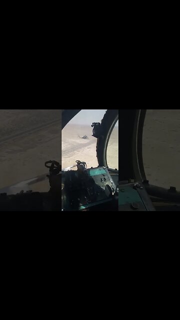 A pair of Mil Mi-25 of the Syrian Air Force on patrol flight
