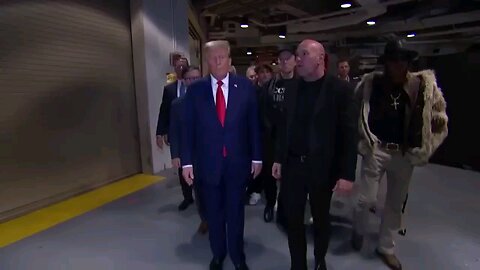 president - elect Donald Trump arrives at Madison square garden along side Elon Musk