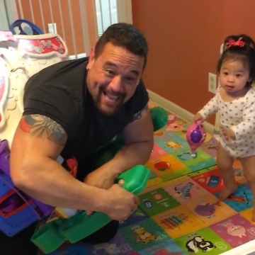 Muscular Dad Gets Stuck in Toddler's Toy