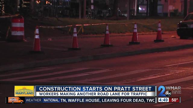Construction underway on third lane along Pratt St.