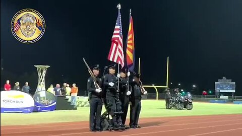 Paralyzed Peoria police officer stands for National Anthem