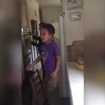 Funny Tot Boy Falls Off A Chair