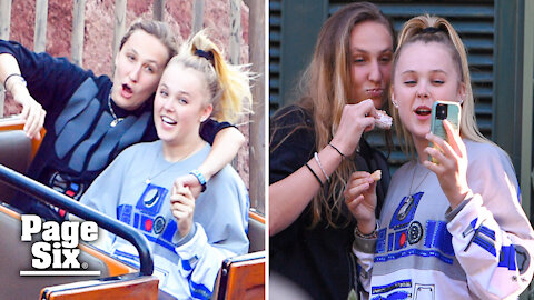 Jojo Siwa and girlfriend Kylie Prew get flirty during Disney World date