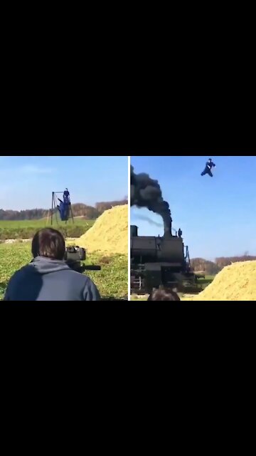 Acrobat performs insane stunt over high speed train