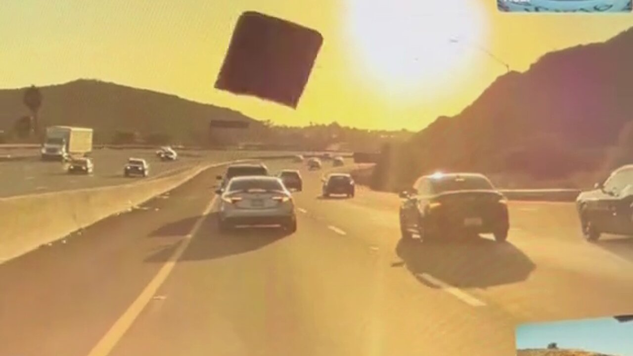 Flying Debris Hits My Tesla Car on The Freeway | TeslaCam Live