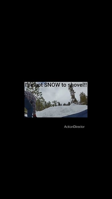 Shoveling snow with the cabin.