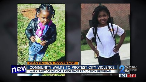 Community walks to rally against violence