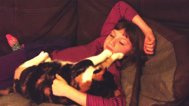 "Cat Gives Girl Face Massage"