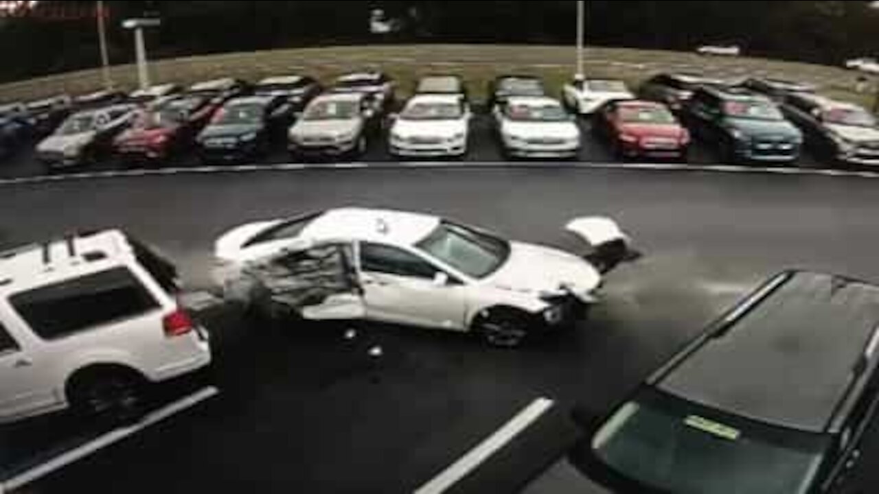 Driver causes terrifying accident at car dealership