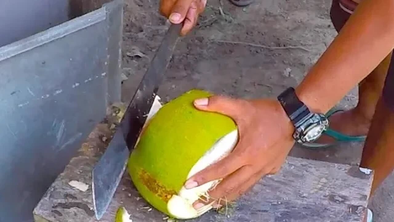 How to Cut a Coconut To Drink Demonstration