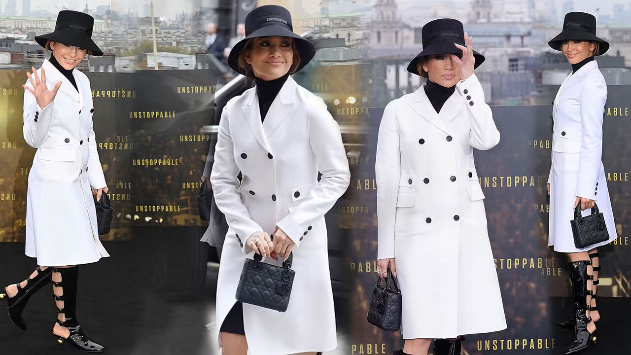 Jennifer Lopez in white trench coat and black cut-out PVC boots at the Unstoppable film photocall🤍