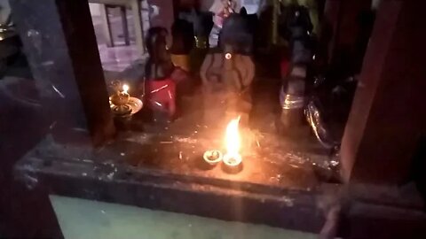 Going around the nine planets ( Navagraha) at an Hindu Temple