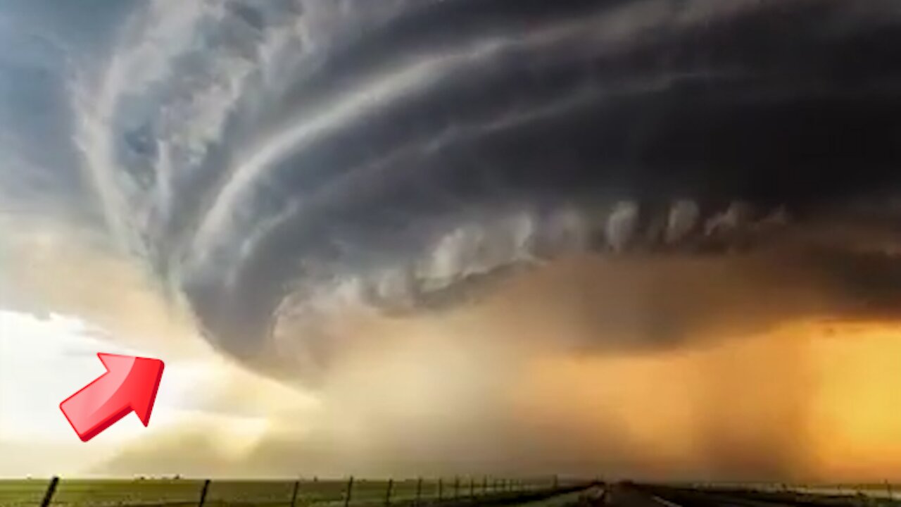 A huge cloud swirling above a field road [Mysterious]