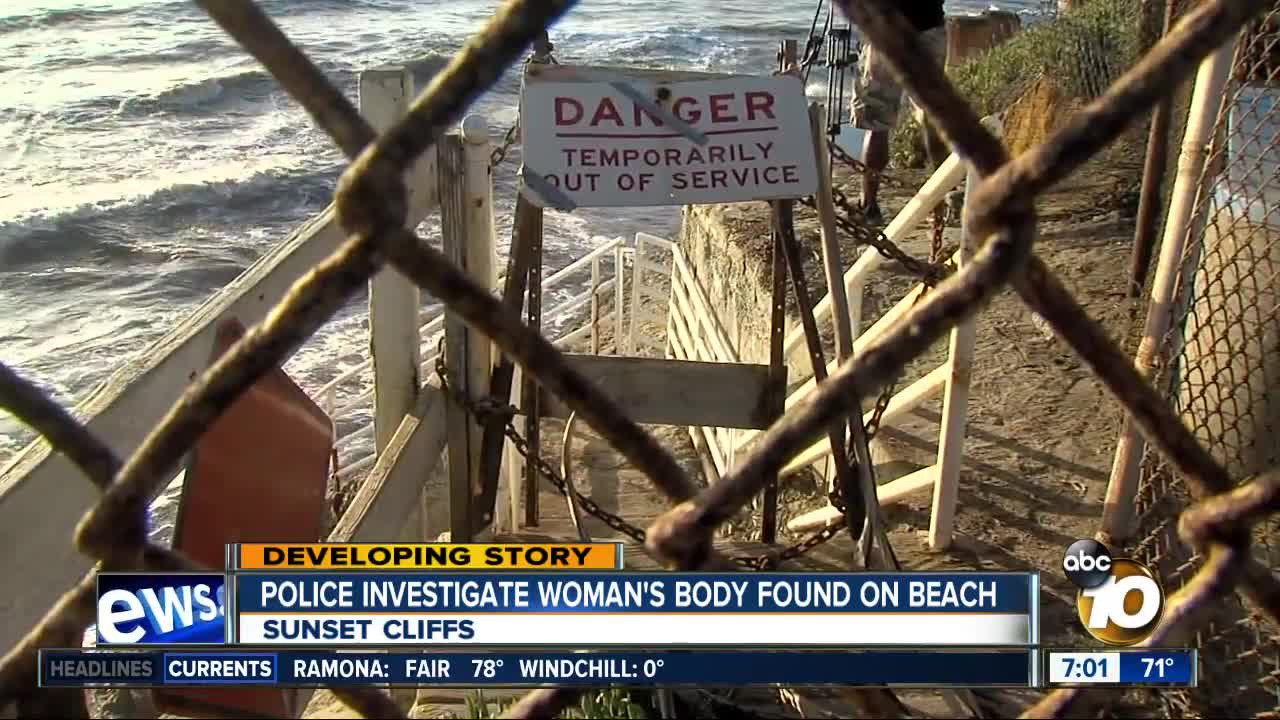 Police investigate woman's body found on beach