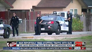 Man trying to stop traffic with gun