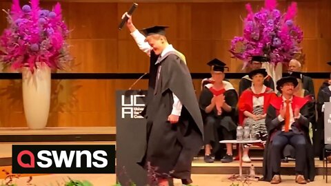 Cheeky student nicks Banksy's honorary professorship certificate during graduation ceremony