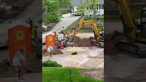 Fills toy truck with dirt excavator