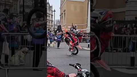 motor bike does a wheelie out side Horse Guards parade #horseguardsparade