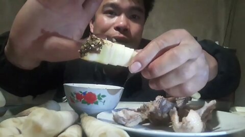 A simple dinner of boiled bitter bamboo shoots and super-salted chili duck meat