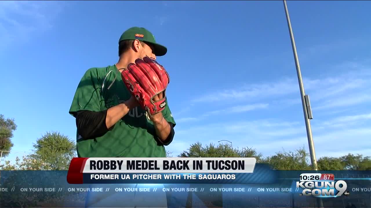 Robby Medel helping the Saguaros gel