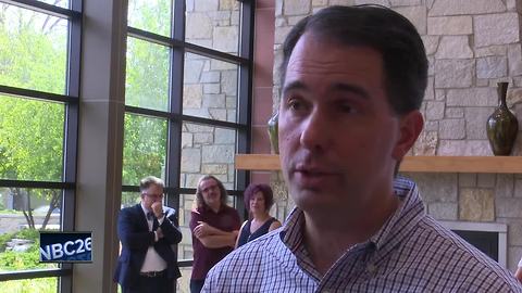 Walker signs state healthcare bill in Green Bay