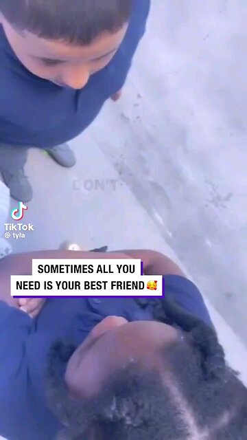 Wholesome: Boy helping console his friend after she was called dumb. Try not to smile.