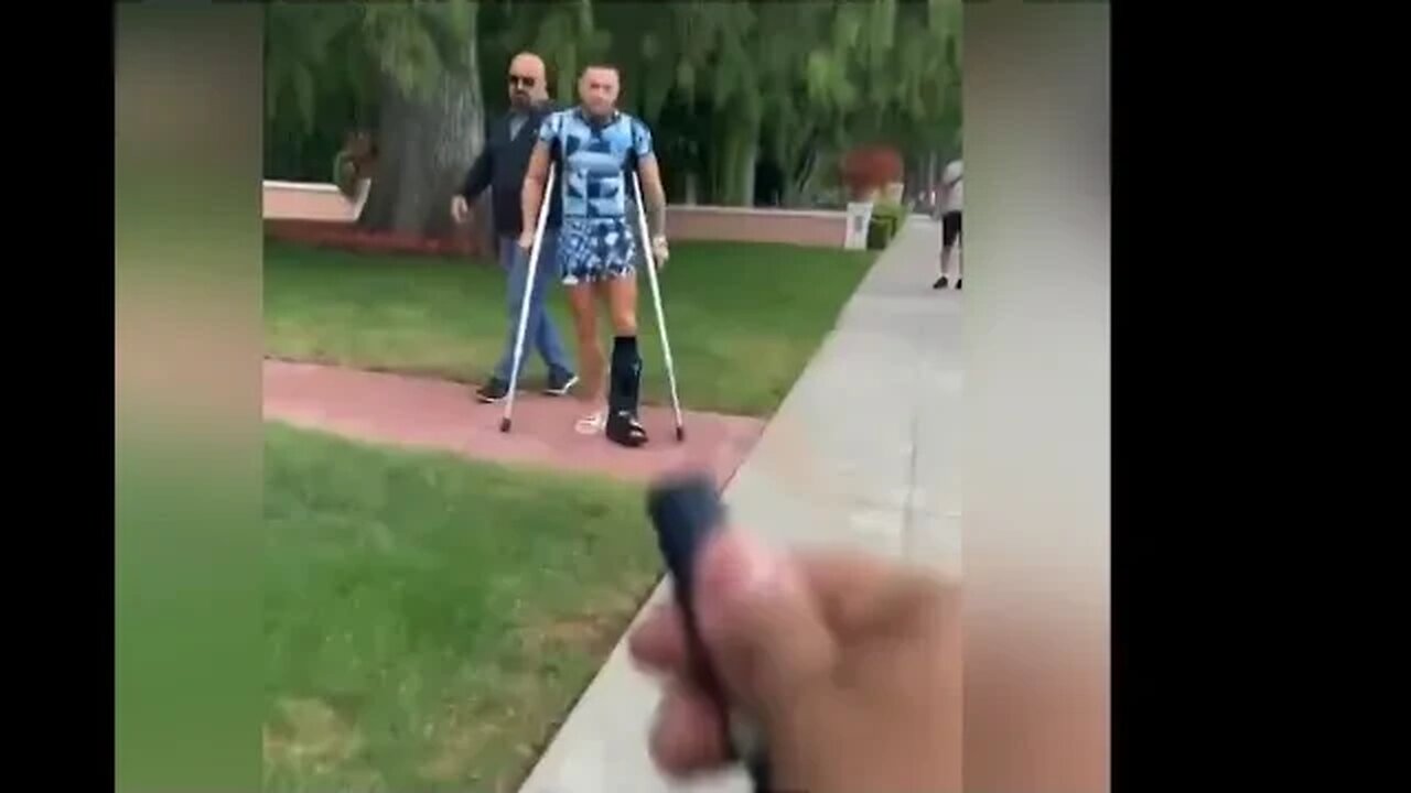 Conor Mcgregor signing UFC gloves, posters and Proper Twelve for fan