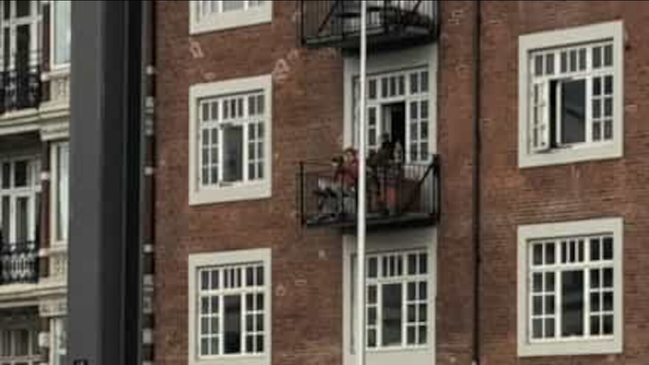 Man plays trumpet for neighbors during quarantine