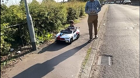 Kids playing with car