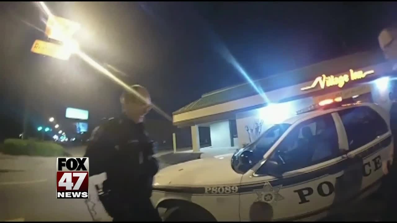 Woman steels police car