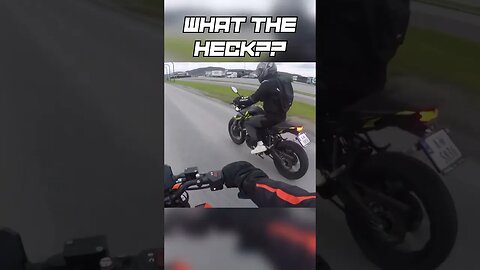 Biker slaps another biker's mirror!