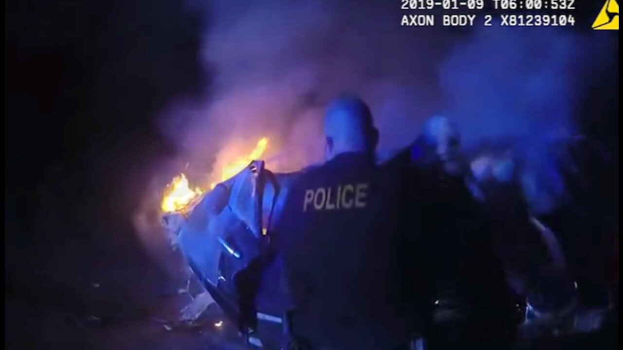 Officers rescue man stuck in burning vehicle after head on collision